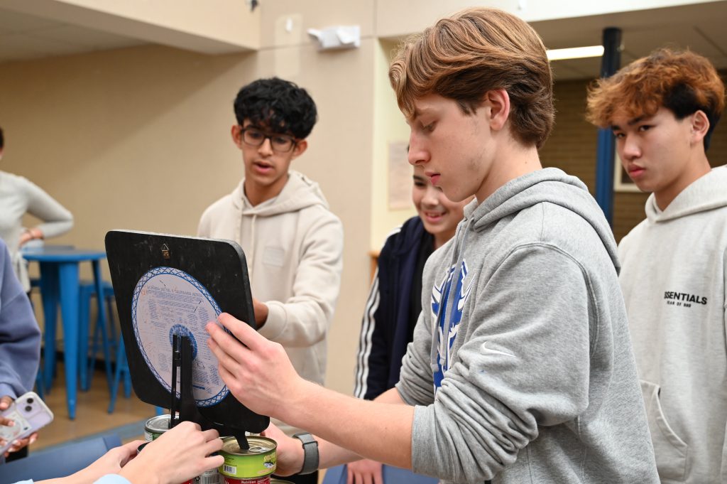 Students making tower