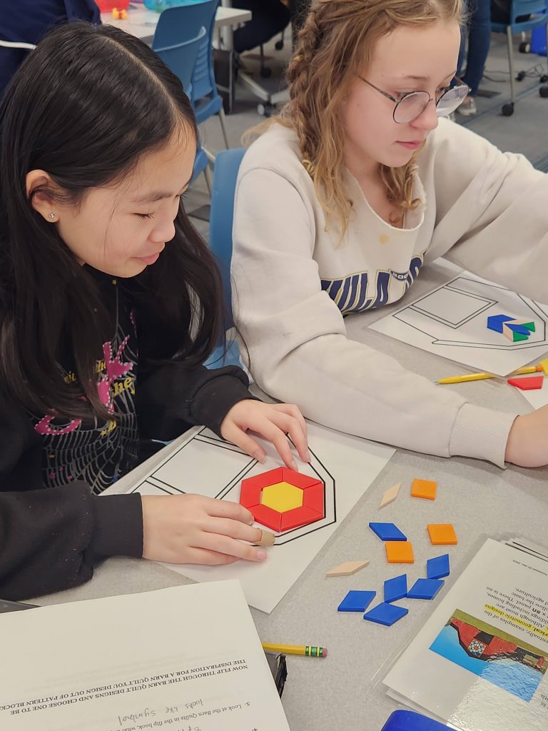 An image of students creating barn quilts.