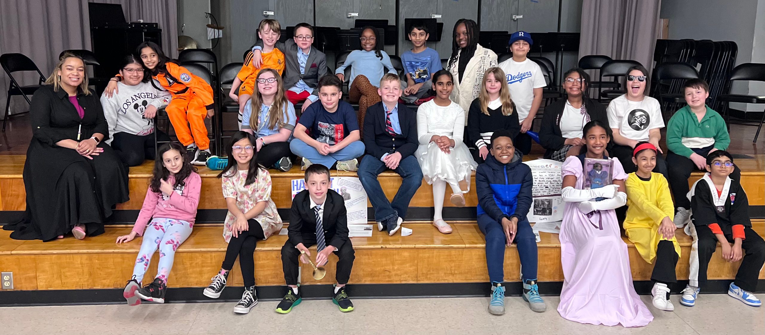 An image of a fourth grade class of students dressed up as influential black figures for their Black History Month project presentations.